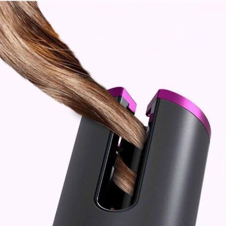 Portable Conair cordless auto curler with ceramic curl chamber